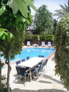 Renos Hotel Apts Polis Esterno foto