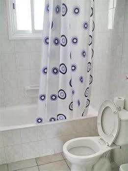Renos Hotel Apts Polis Esterno foto